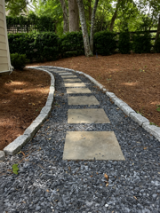 Paver walkway with stone border in Hampton Roads
