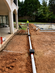 Yard drainage pipe installation in Hampton Roads